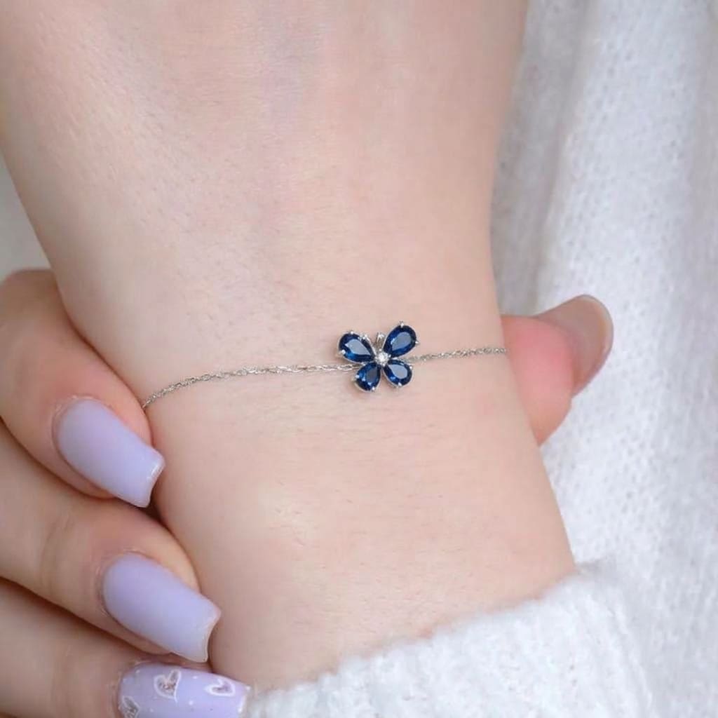 sapphire dold bracelet on girls wrist