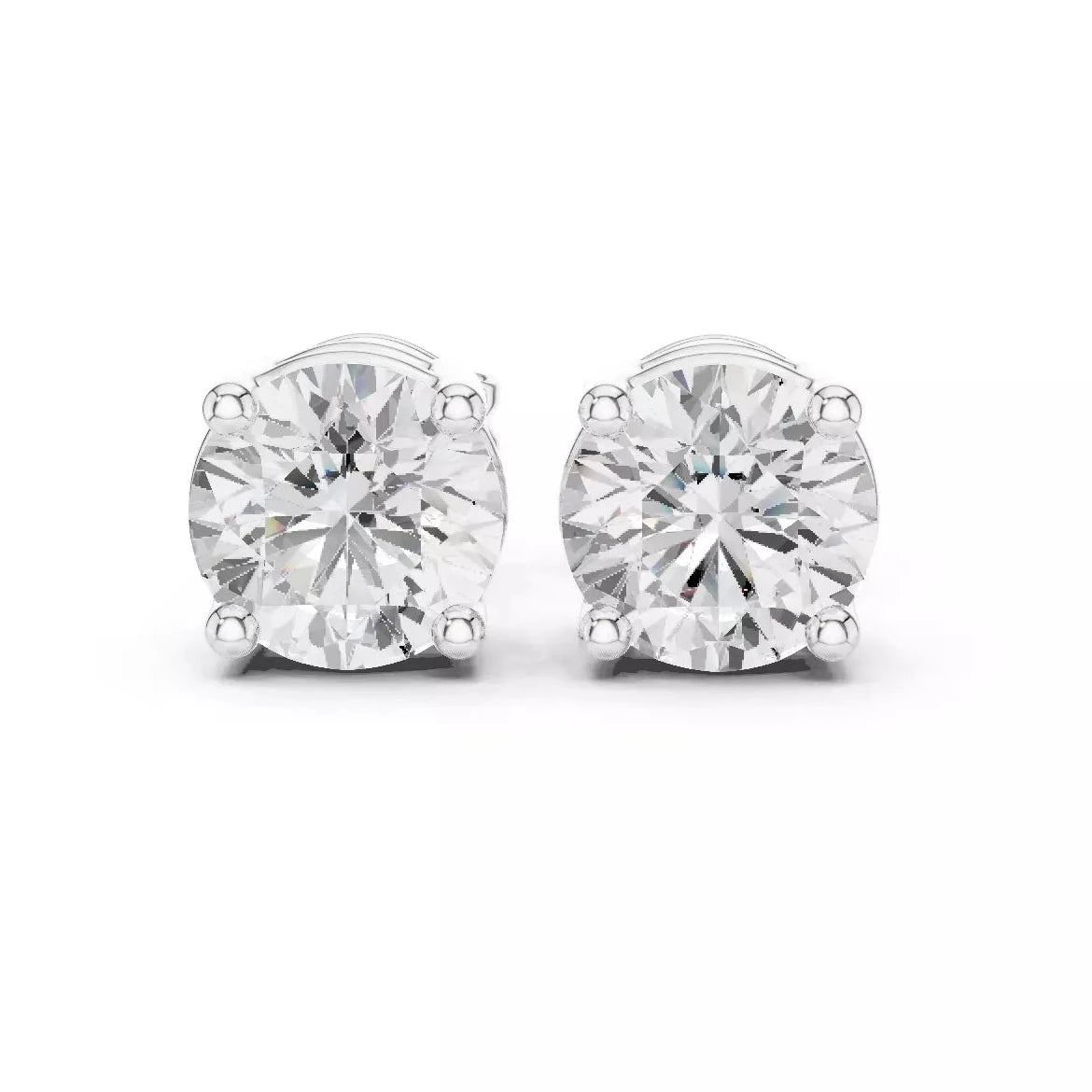 A pair of round-cut stud earrings in 14k white gold four-prong setting, shown on a clean white background.