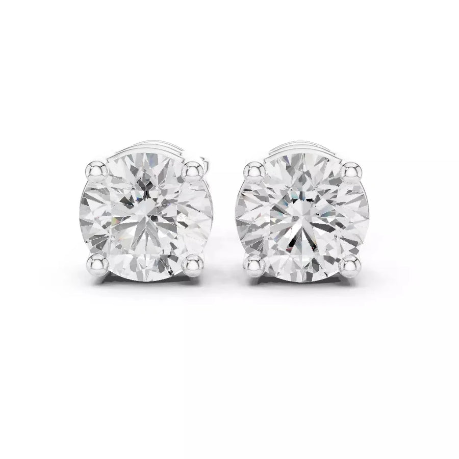 A pair of round-cut stud earrings in 14k white gold four-prong setting, shown on a clean white background.