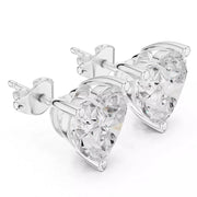 A pair of heart-shaped stud earrings featuring clear heart-cut gemstones in white gold setting, shown on a plain white background.