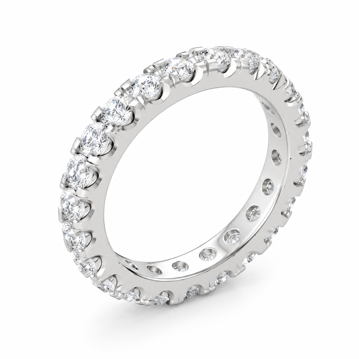 A white gold eternity ring set with round brilliant-cut diamonds, shown at an angle on a clean white background.
