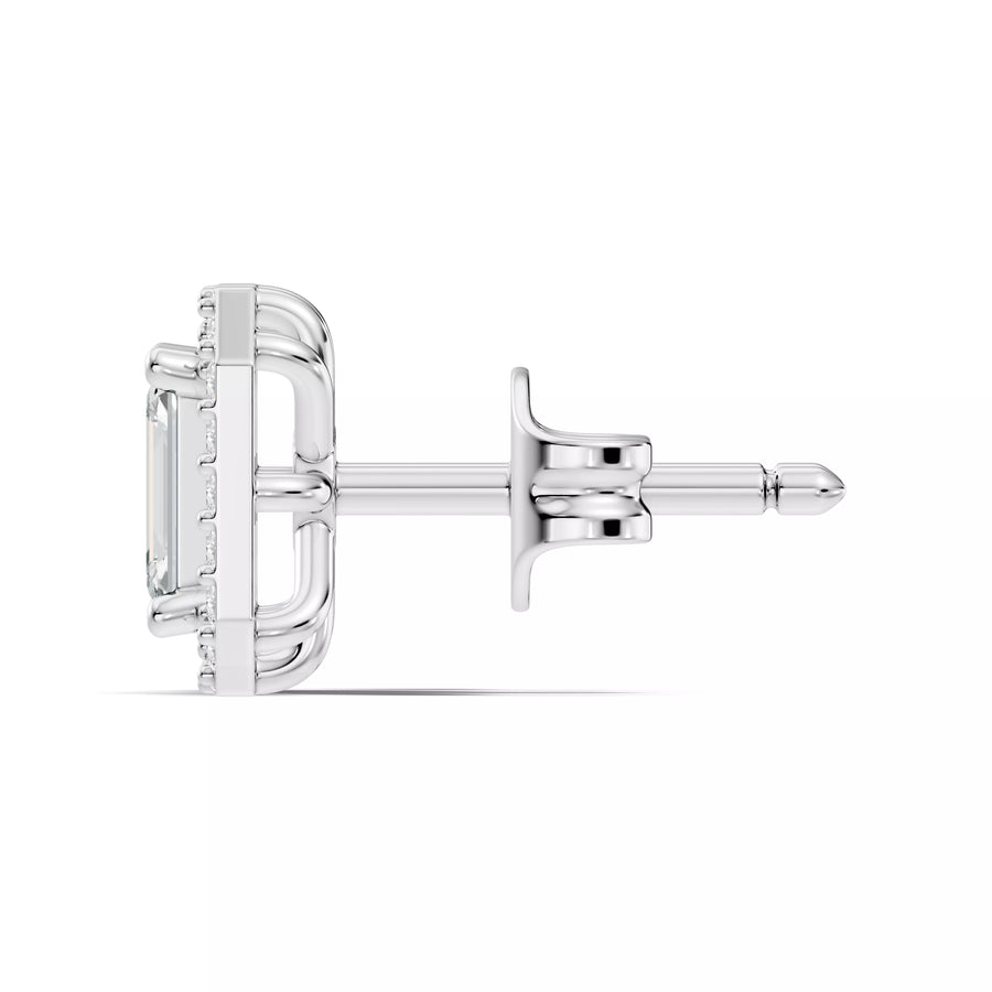 A single silver stud earring shown in side profile on a clean white background, featuring a rectangular clear gemstone in a prong setting with a post and butterfly back.