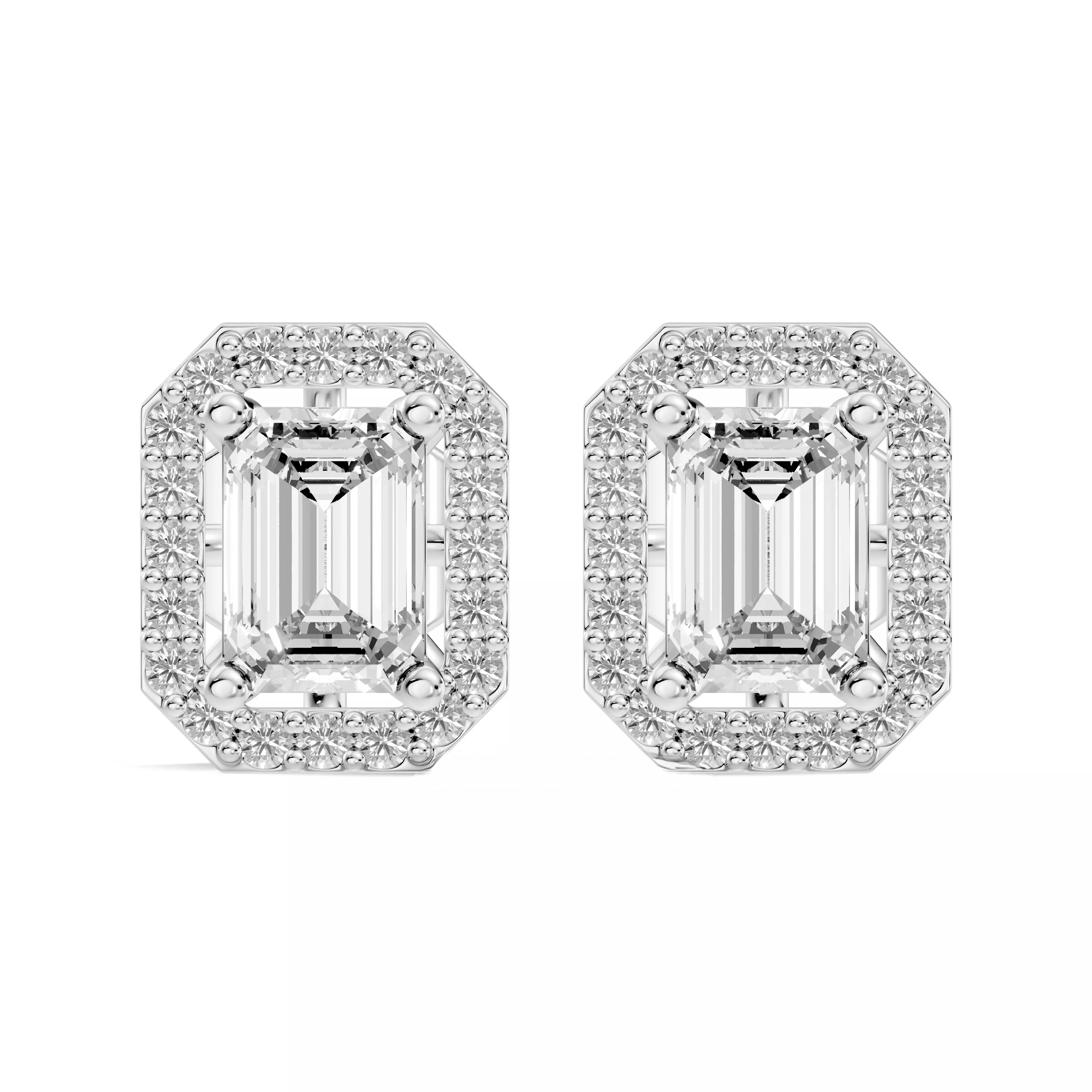 A pair of emerald-cut halo stud earrings in 14k white gold, featuring a large clear central stone surrounded by a halo of smaller clear stones, set against a plain white background.
